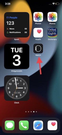 Abrir app Watch en iPhone.